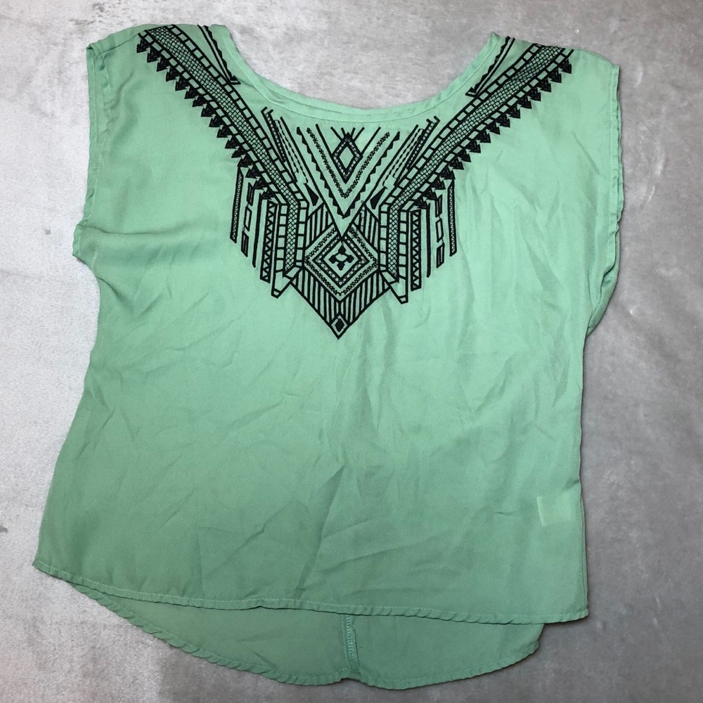 Green blouse with black embroidery